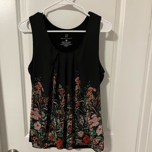 New York & Company black shell with sheer floral overlay in front. Size L